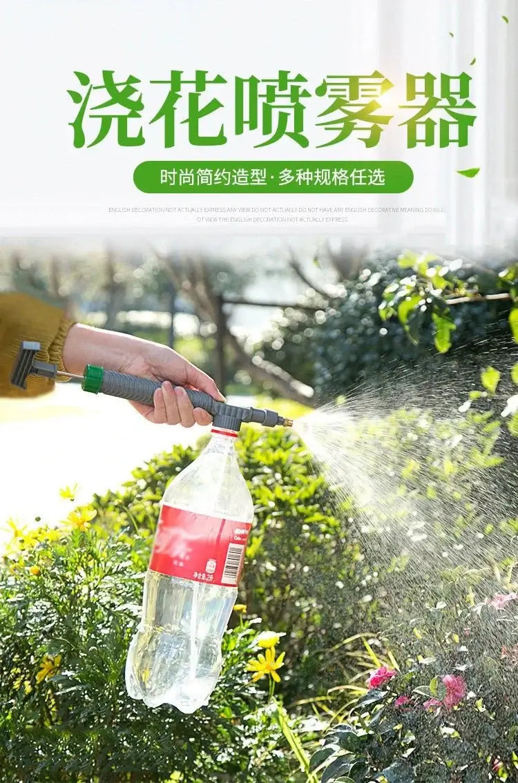 Beverage Bottle Sprayer in use for watering flowers and plants in a garden setting.