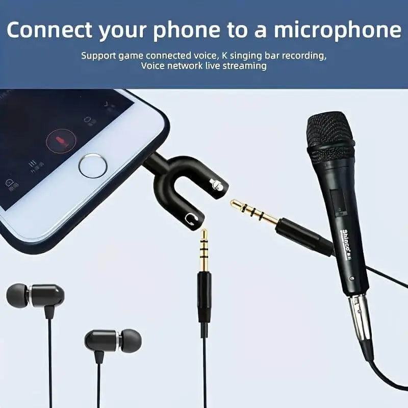 Headphone jack splitter connecting a phone to headphones and a microphone for audio output.