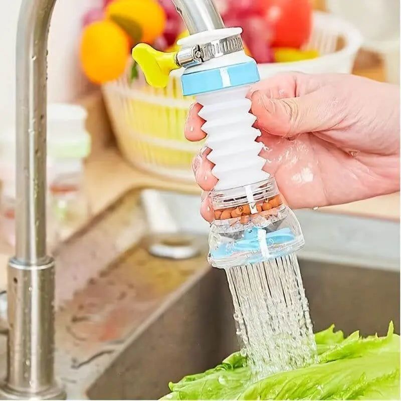 Splash-proof shower header attached to a kitchen faucet washing lettuce.