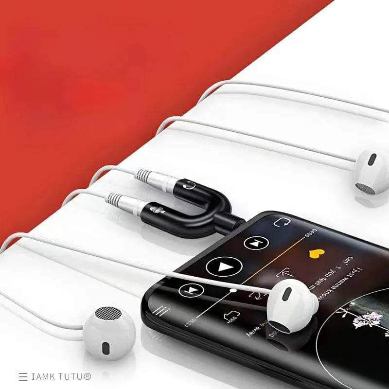 Headphone jack splitter connecting multiple headphones to a smartphone for enhanced audio sharing.