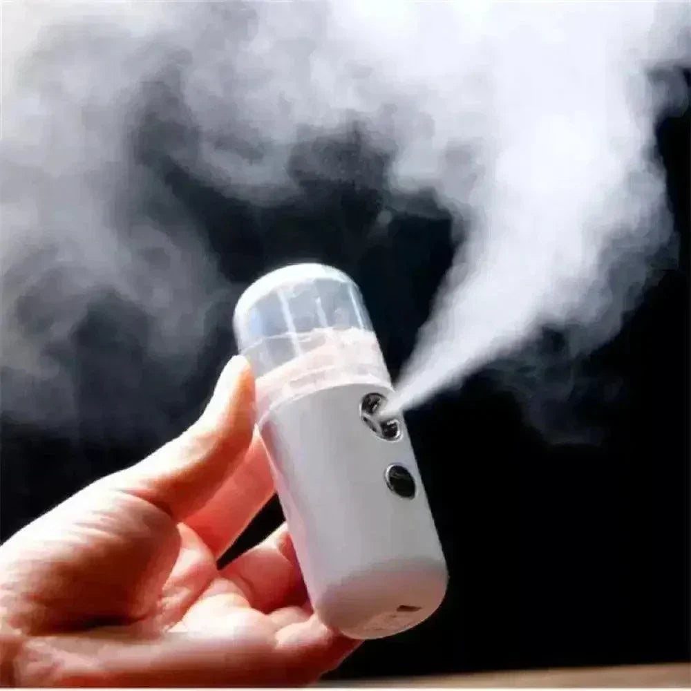 USB Facial Sprayer emitting fine mist for daily skin hydration and freshness.