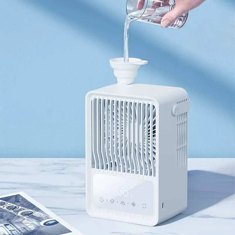 Portable air conditioner on a desk with water being poured in.