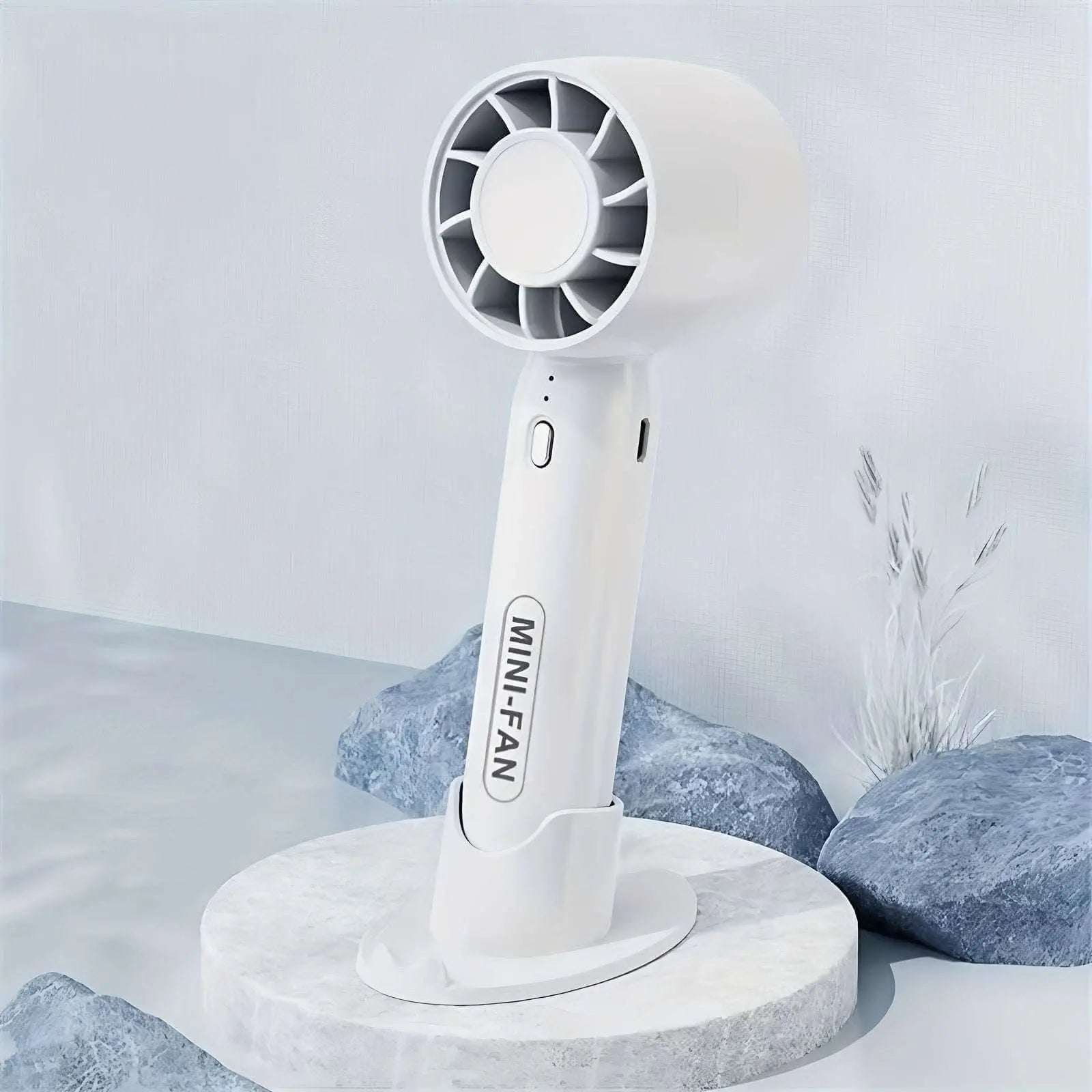 Portable mini fan USB rechargeable with polished finish, wearable design, and button control, ideal for indoor and outdoor use.