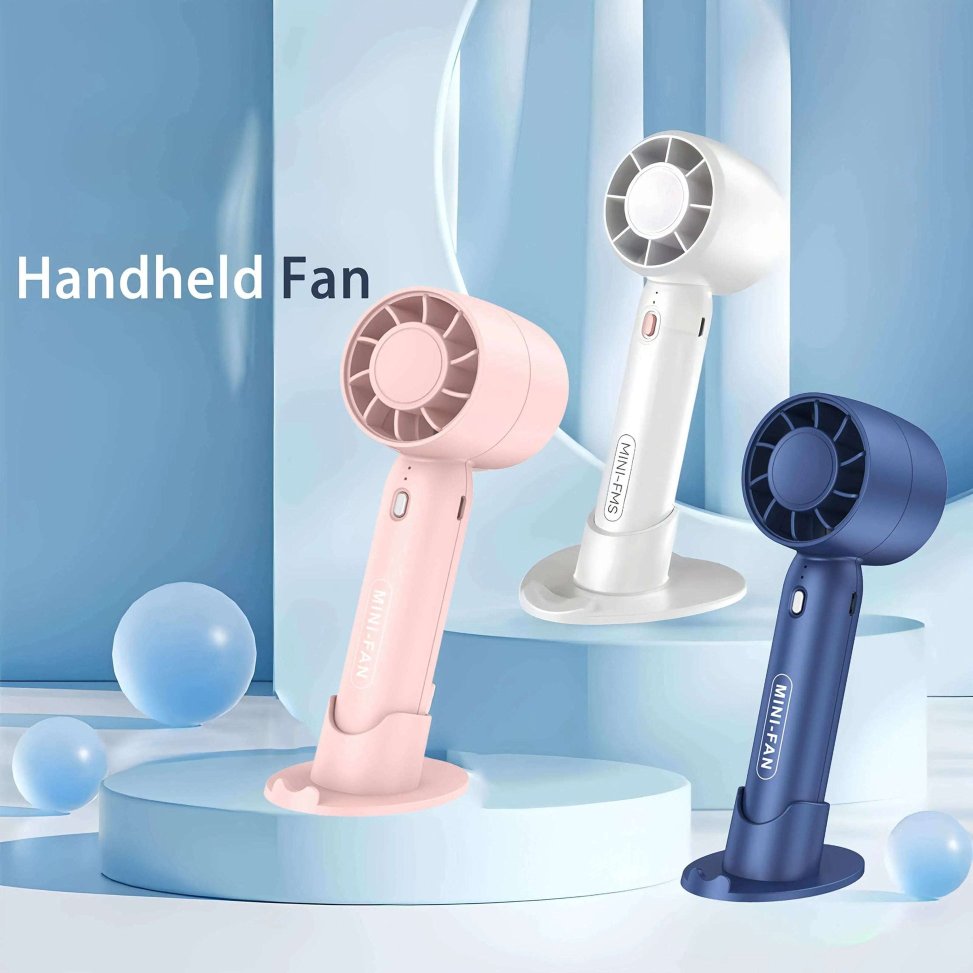 Portable mini fan in pink, white, and blue, with USB rechargeable feature and button control, displayed on a pastel blue background.