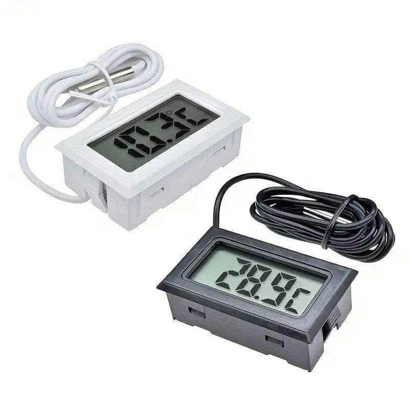 Mini LCD digital thermometer for accurate temperature readings with copper contact material, available in black and white.