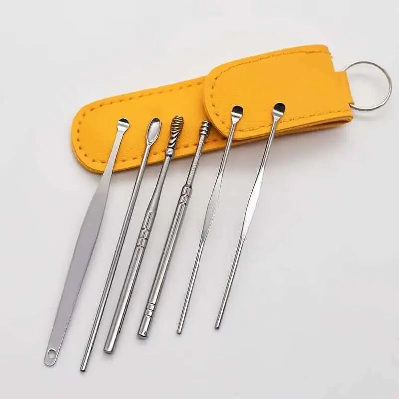 Ear cleaning set with 10 stainless steel tools and yellow case.