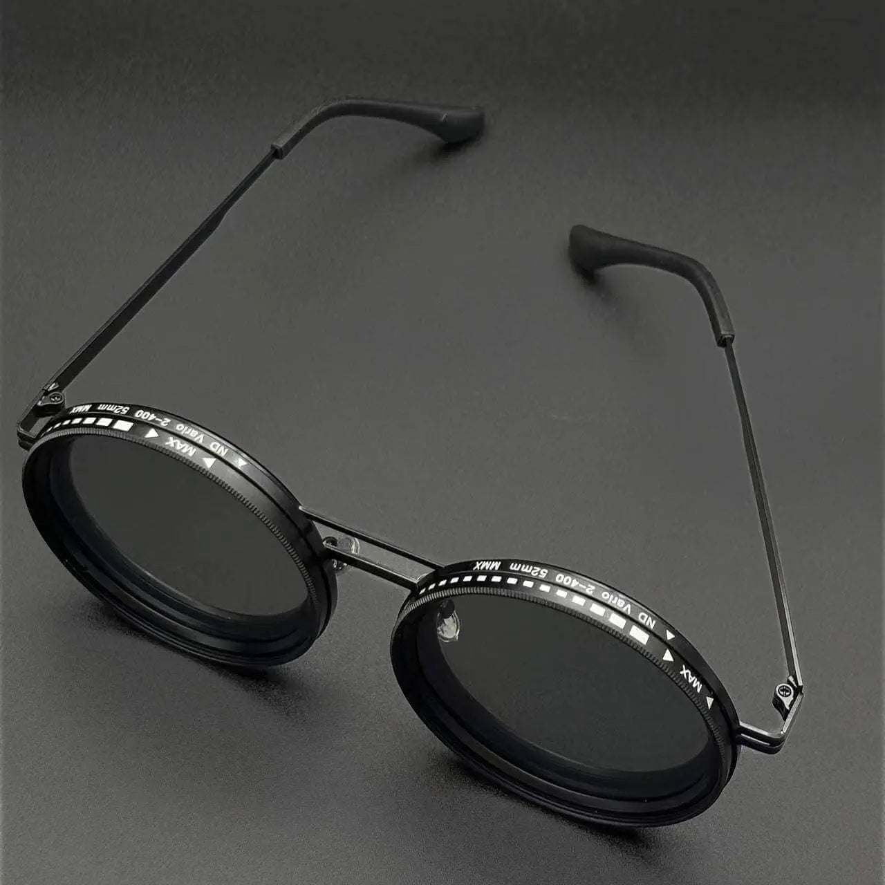 Aluminum frame glasses with TAC polarized lenses on a black background.
