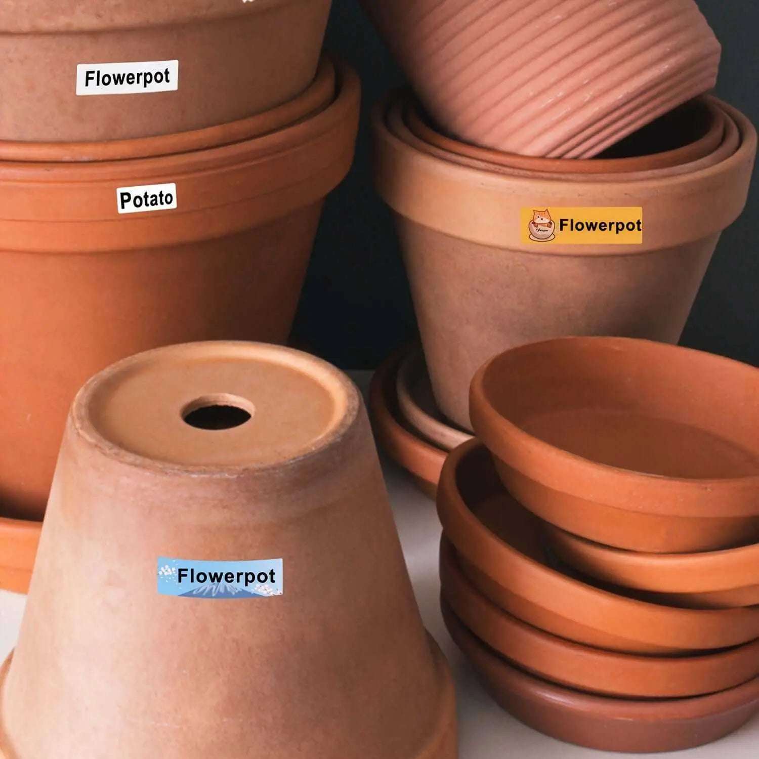 Portable Thermal Label Printer used for labeling flower pots and potato label on terracotta pots.