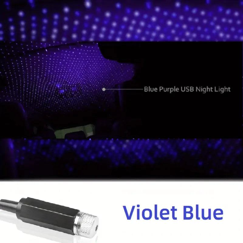 USB star projector night light illuminating a starry sky in violet blue.